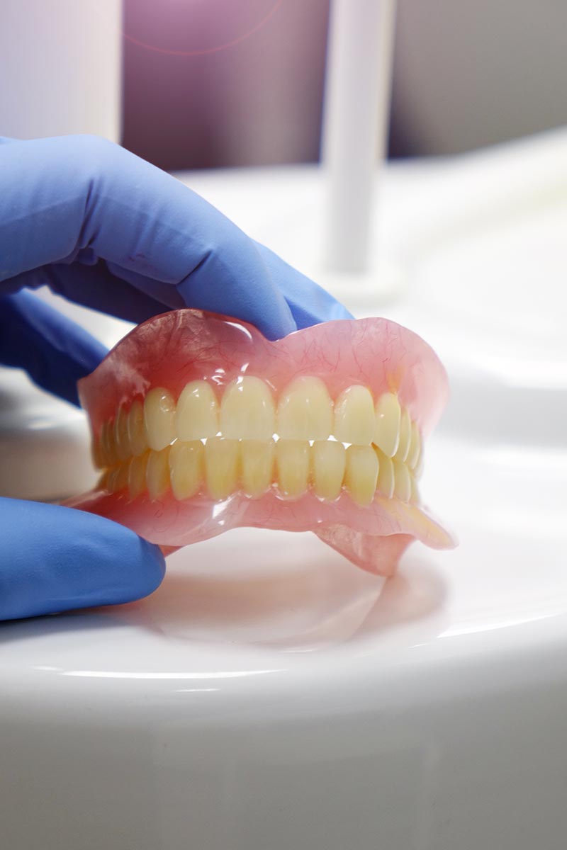 The dentist's office. The layout of the human jaw. Red gums and white teeth.